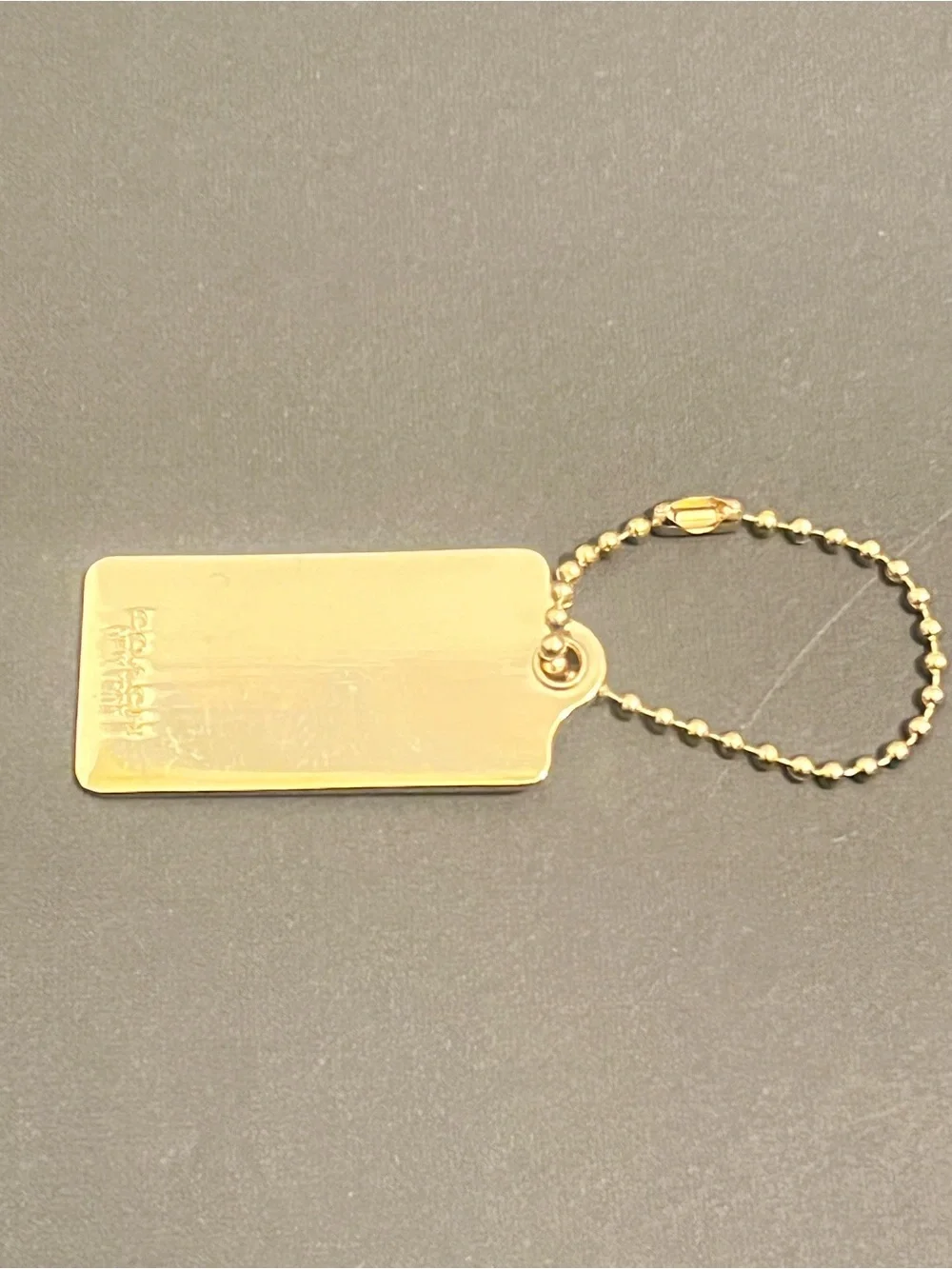 Rare Vintage Coach Gold Tone Embossed Horse & Carriage Dog-Tag Key Holder